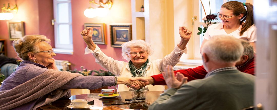 Elderly Women in care homes having fun